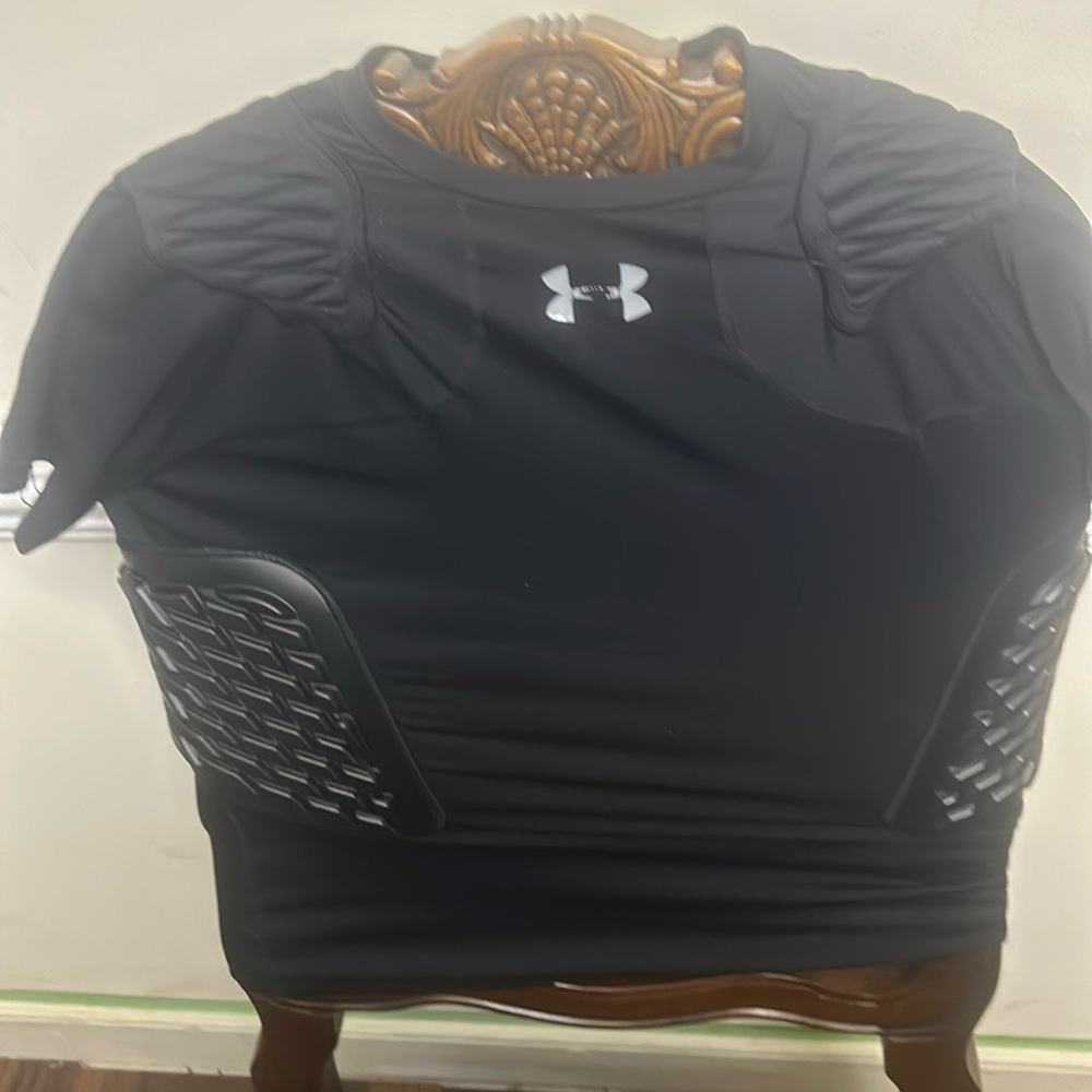 Under armour dri-fit  padded football shirt. Size Large